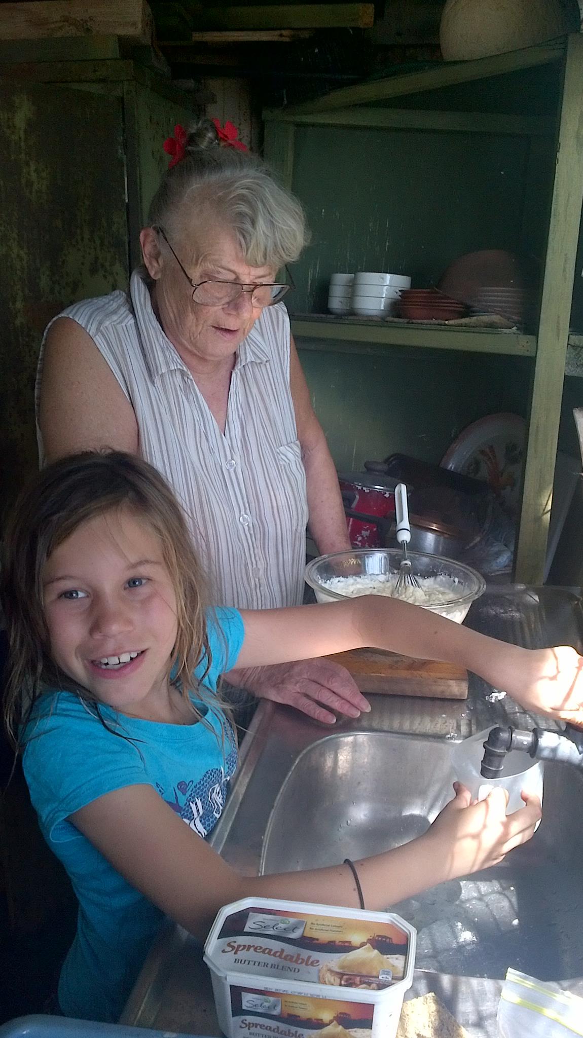 Rhonda cooking her Chutney with Grandaughter